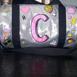 Justice Girls "C" duffle bag.